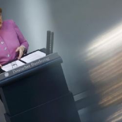 Merkelová a spolkové země se přou, kdo zaplatí péči o migranty