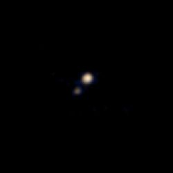 Sonda New Horizons pořídila první barevnou fotografii Pluta
