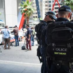 
Sydney den poté: Lidé nosí květiny k místu tragédie
