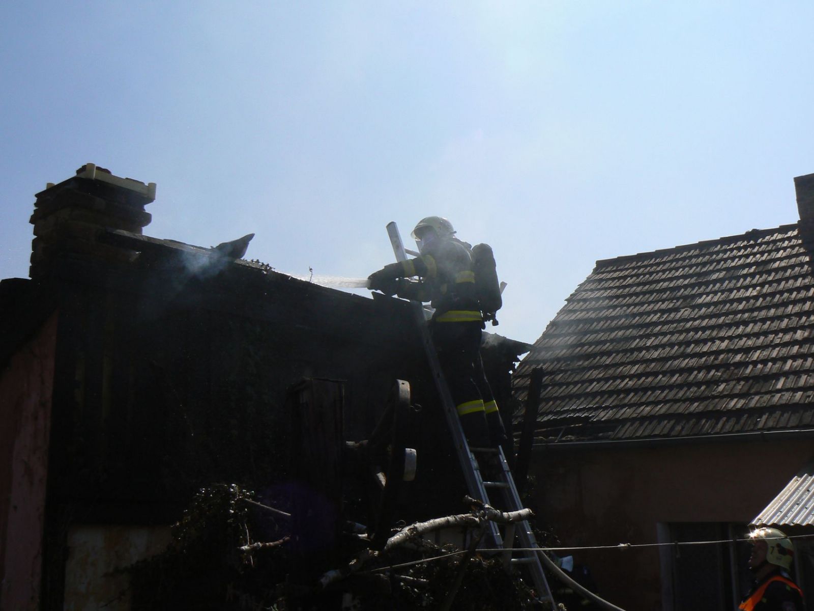obrázek: Žena v Nýřanech o požáru u svého domu nevěděla 